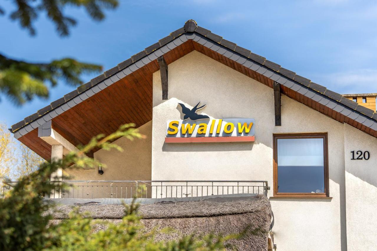 Апартаменты Osrodek Wypoczynkowy Swallow Грзибово Экстерьер фото